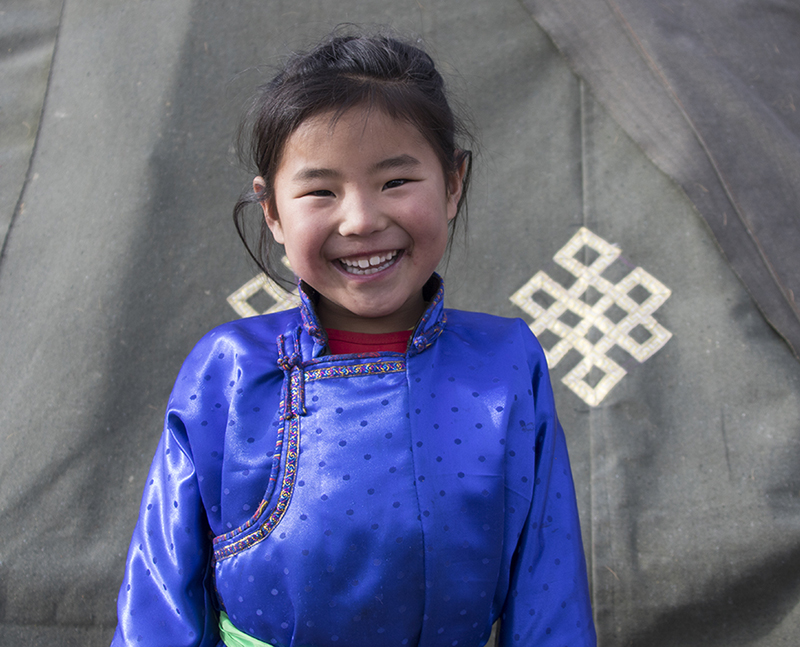 picture of reindeer herding girl in Mongolia